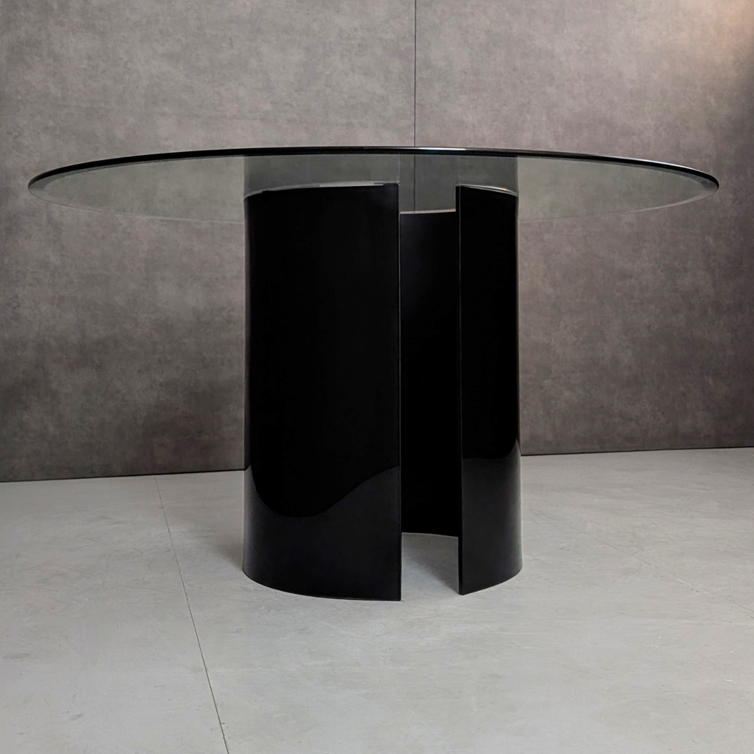 Round Glass Dining Table with Black Glass Segmented Pedestal