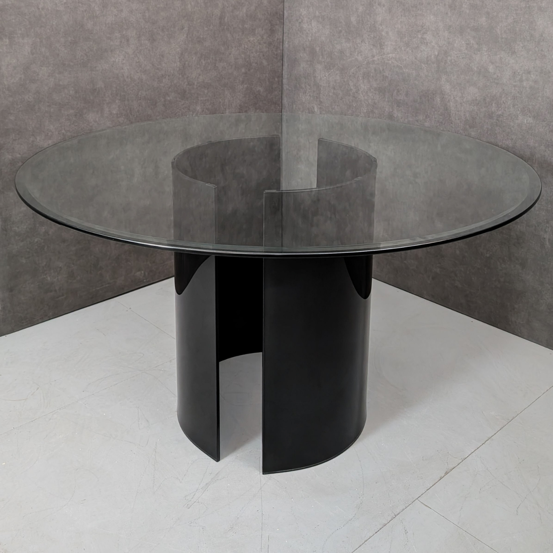 Round Glass Dining Table with Black Glass Segmented Pedestal