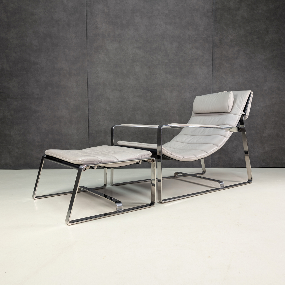 Bay Leather Republic Lounge Chair and Ottoman Aligned with the Minotti Hopper