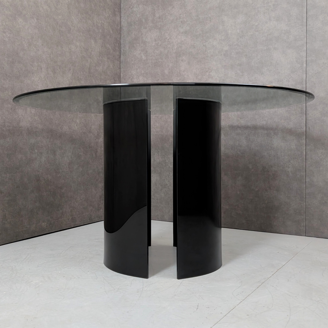 Round Glass Dining Table with Black Glass Segmented Pedestal