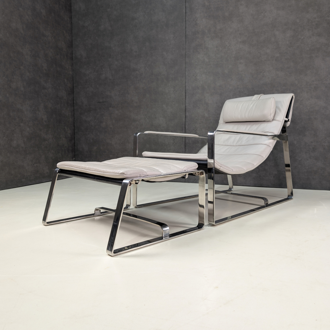 Bay Leather Republic Lounge Chair and Ottoman Aligned with the Minotti Hopper