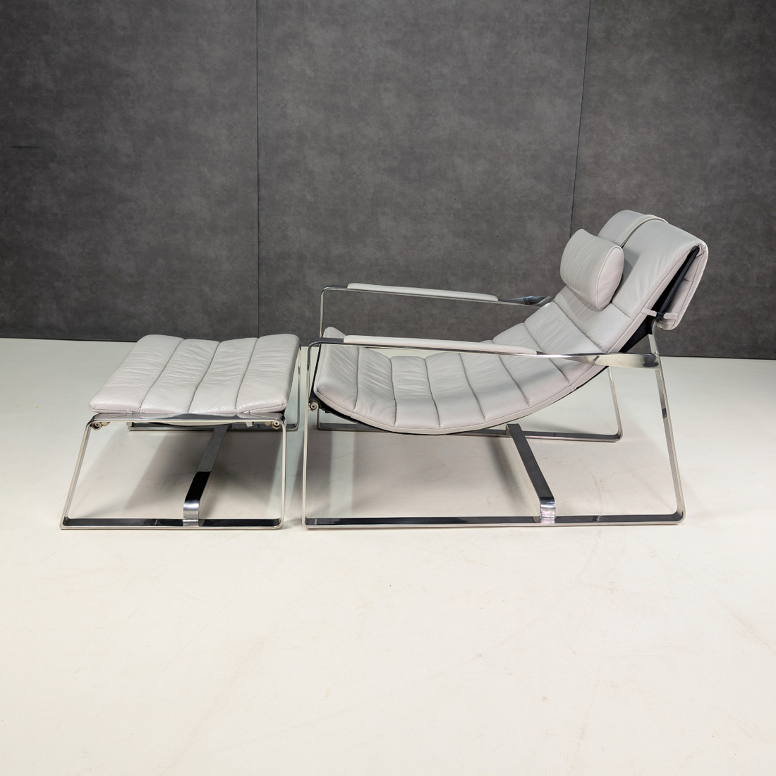 Bay Leather Republic Lounge Chair and Ottoman Aligned with the Minotti Hopper