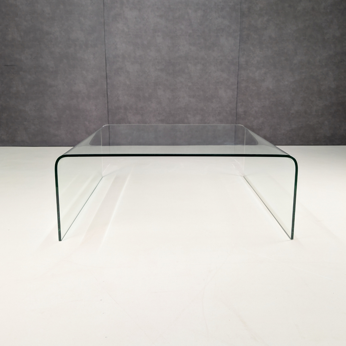 Circa 1980s Clear Bent Glass Waterfall Coffee Table