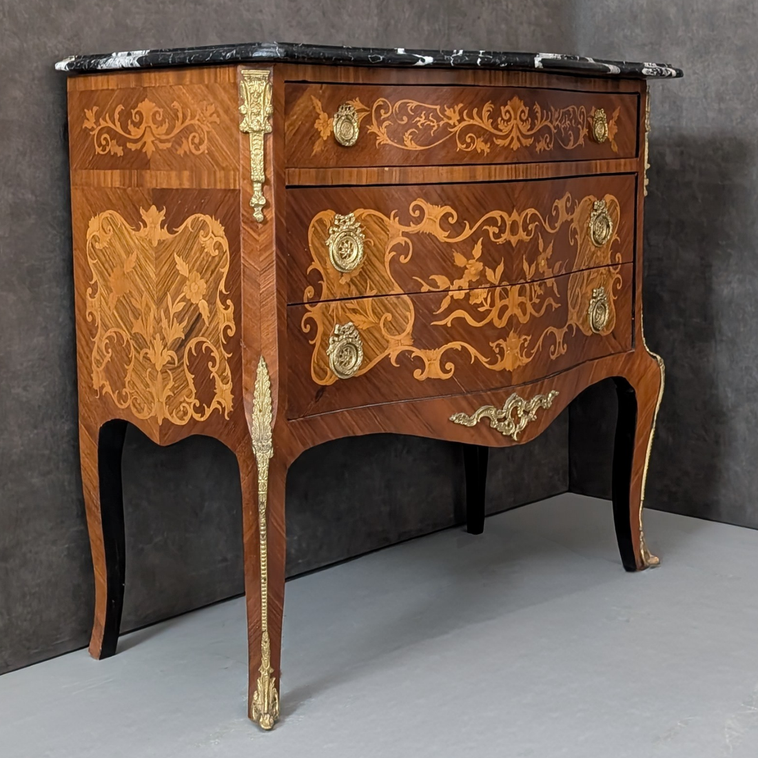 Circa 1930 French Louis XV Marquetry Commode with Black Marble Top