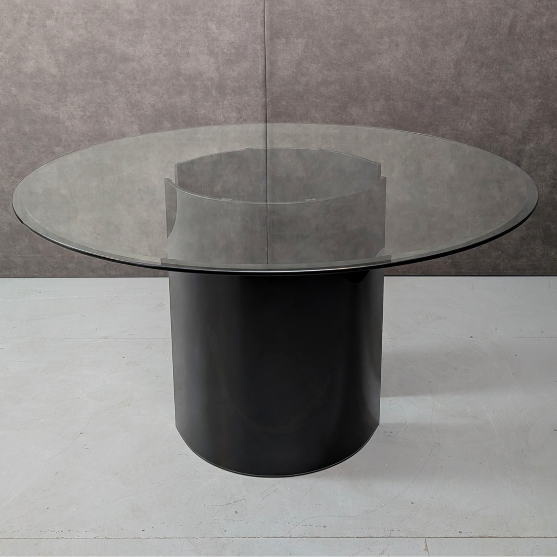 Round Glass Dining Table with Black Glass Segmented Pedestal