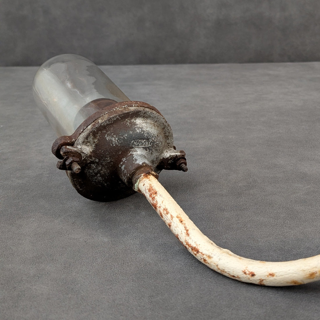 Vintage Industrial Glass and Cast Metal Light | Stamped Harvey