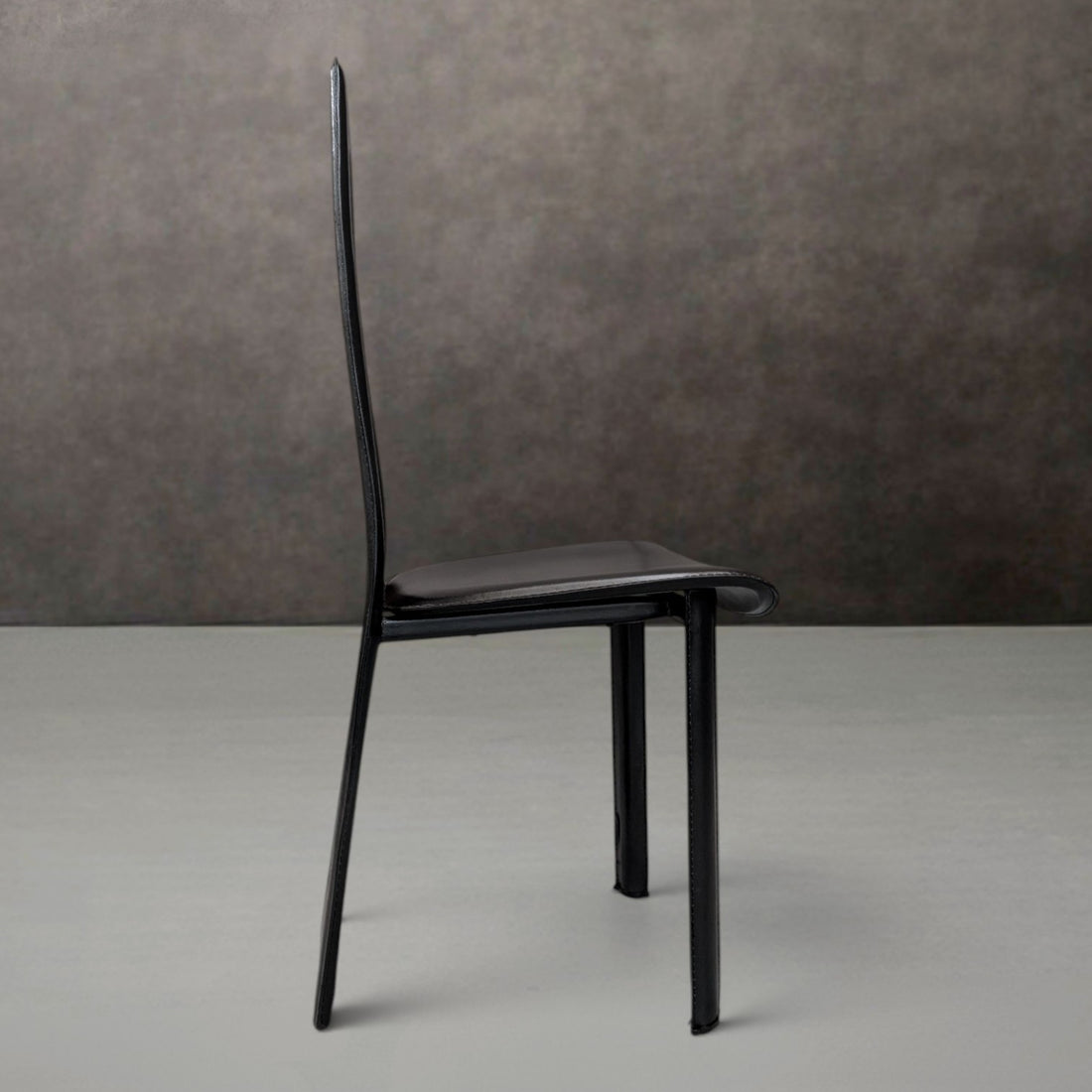 Eight (8) Postmodern Saddle Leather Dining Chairs in the Style of Pietro Costantini