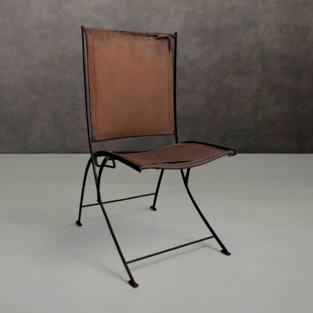 Early to Mid 20th Century French Wrought Iron and Leather Folding Chair