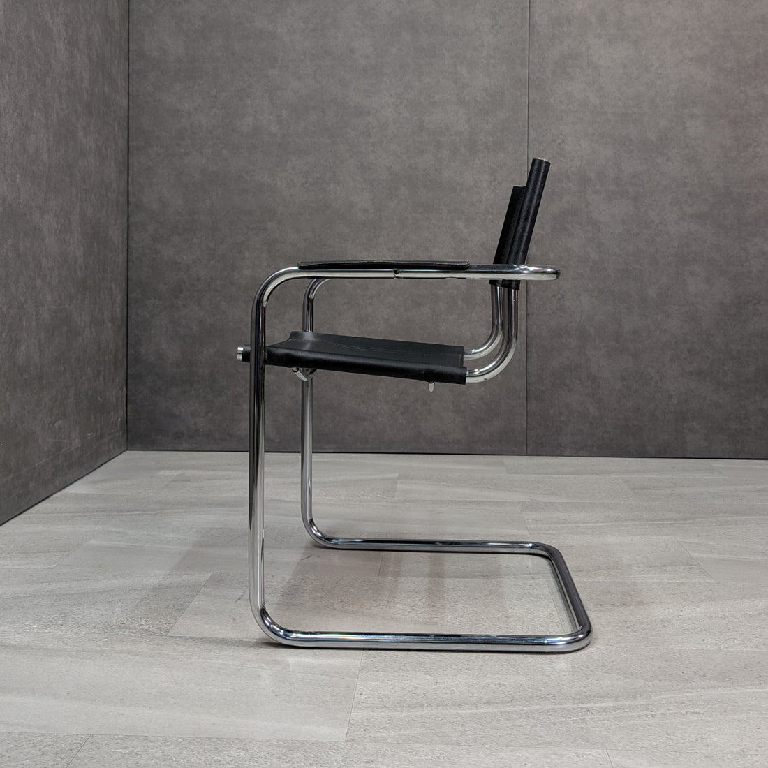 Vintage Bauhaus style tubular chrome and leather cantilever chair detailing