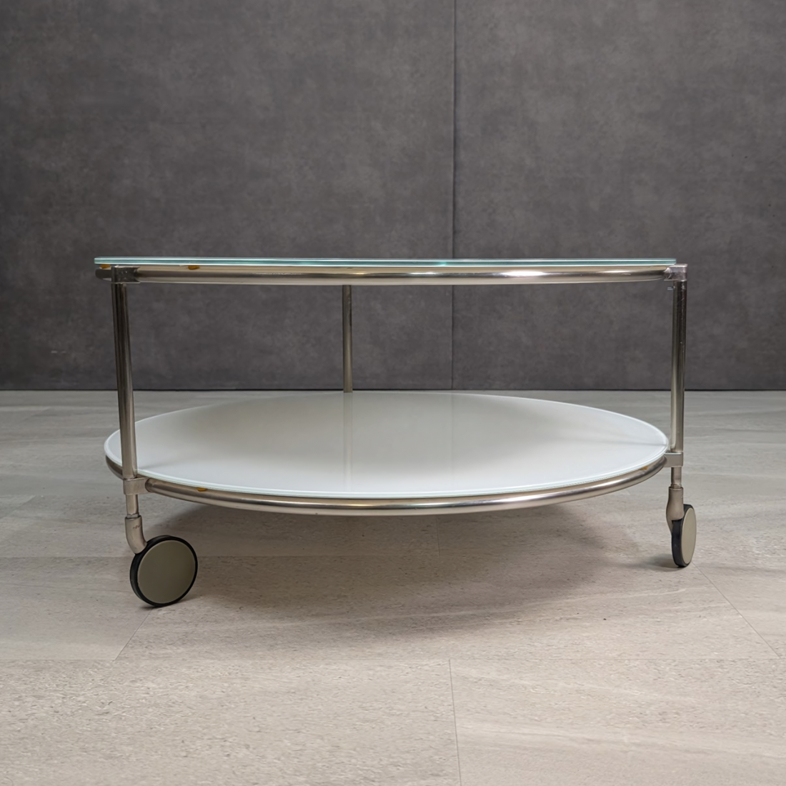 IKEA Strind chrome and white glass coffee table low profile view