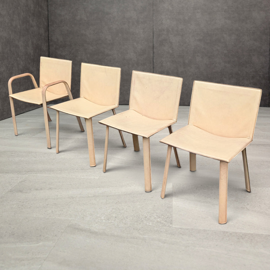 Set of ten 1980s Poltrona Frau Ribot cream leather chairs including two carvers and eight dining chairs