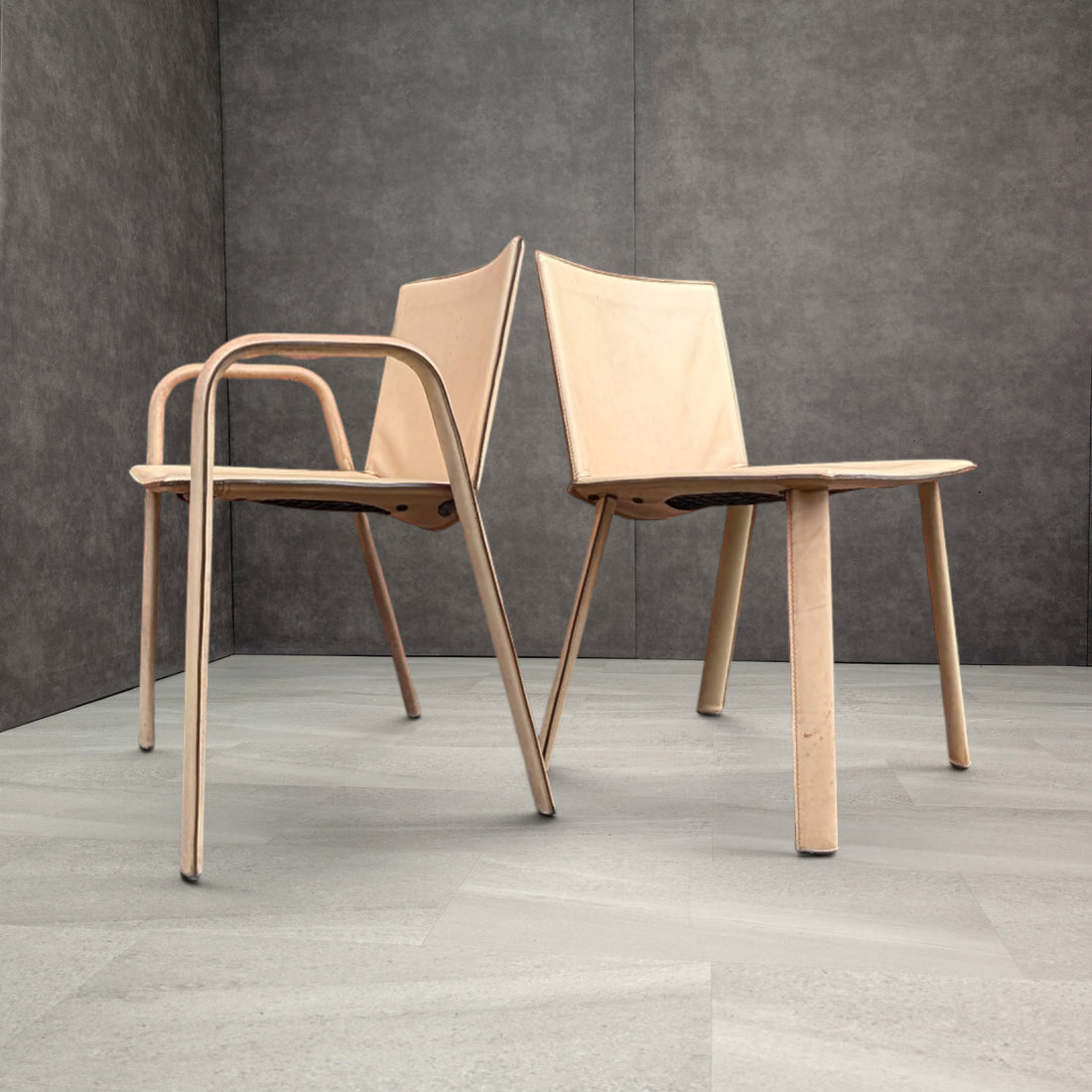 Poltrona Frau Ribot chair with arms and armless chair together