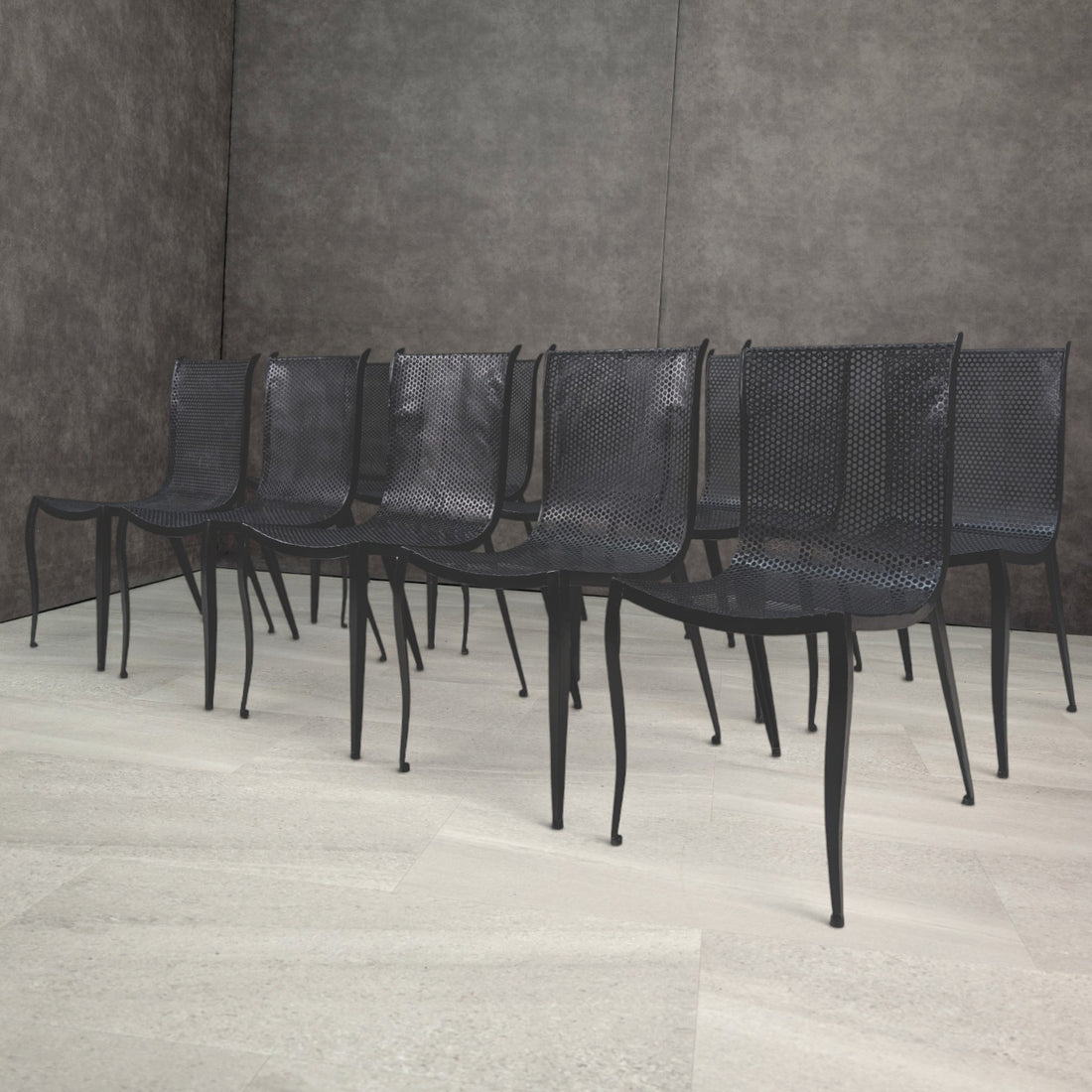 Vintage black perforated aluminium dining chairs with curved seats and slender tapering legs