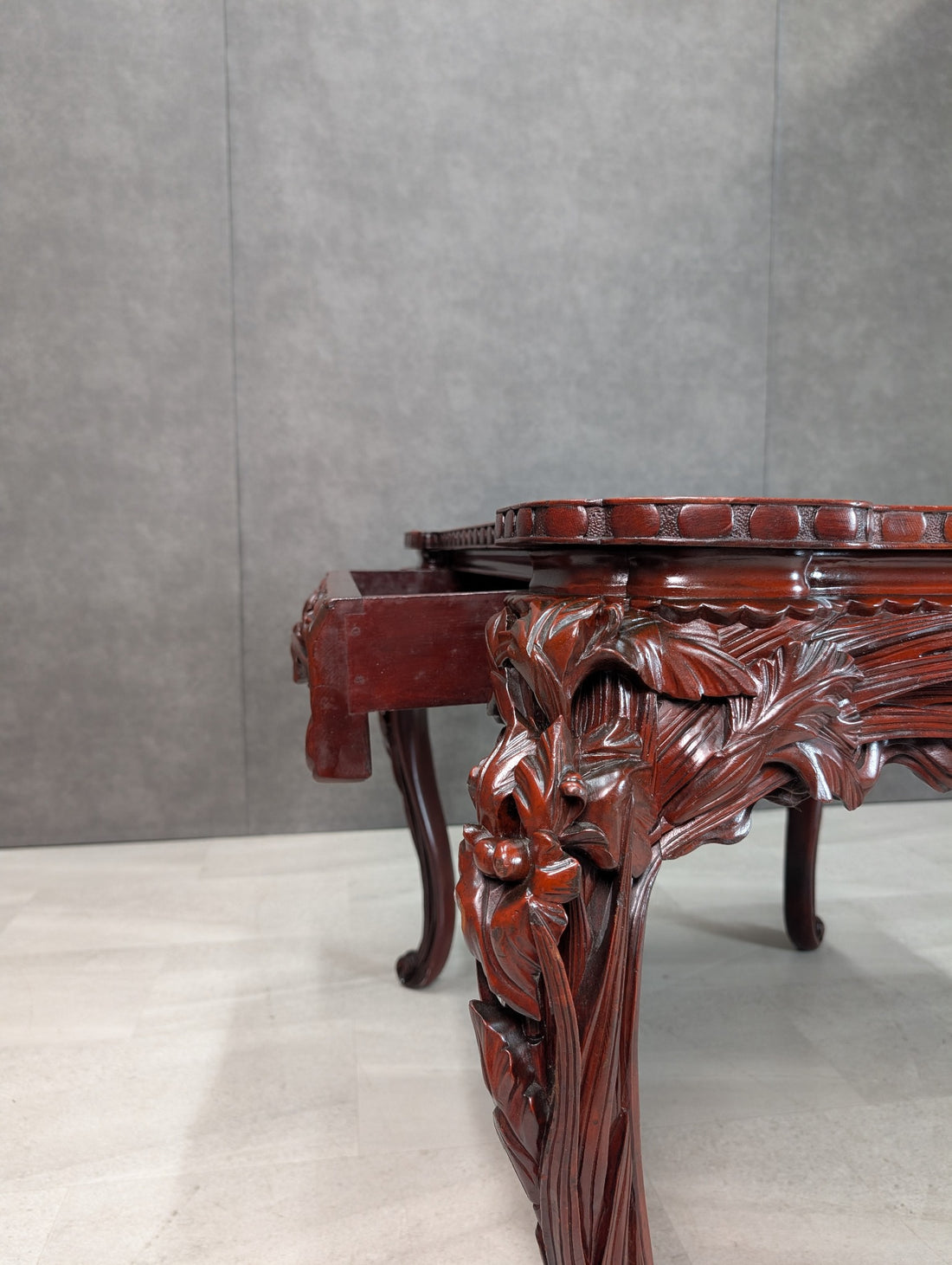 Meiji export writing table showing concealed drawers extended from the opposing sides beneath the top