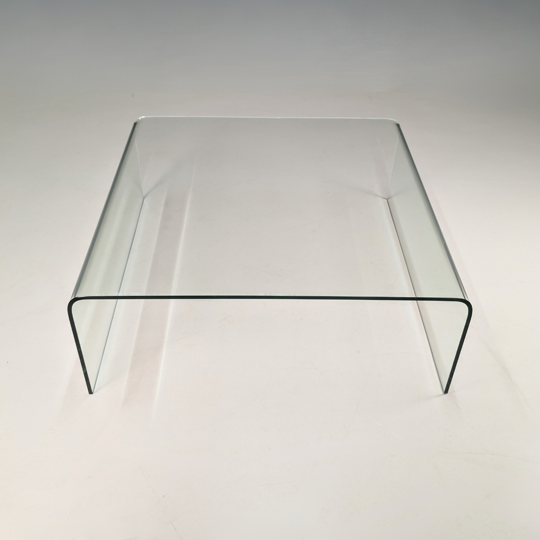 Circa 1980s Clear Bent Glass Waterfall Coffee Table